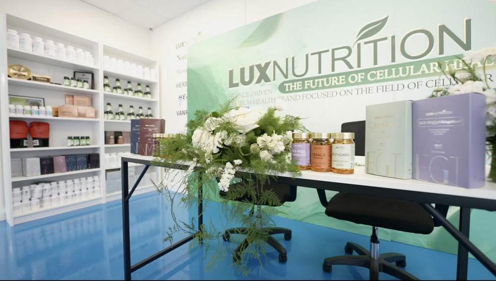 A table with flowers and bottles of medicine

AI-generated content may be incorrect.